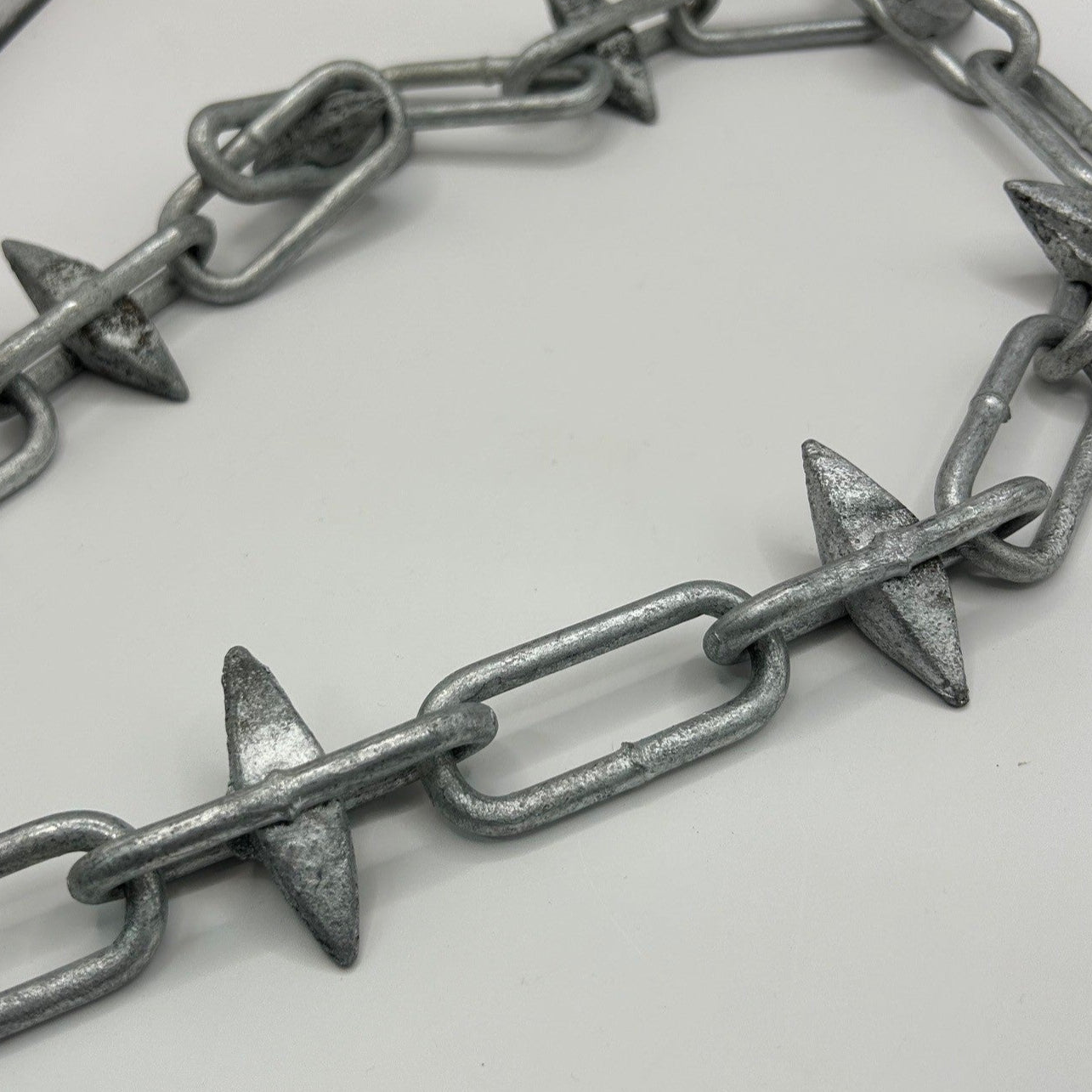 Hot Galvanised Diamond Spike Chain - active proximity deterrent